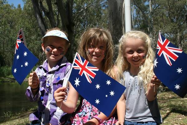 PATRIOTIC: Harrow's Mark Kelly, 7, Miah Kelly, 8, and Bella Young, 4, get into the spirit during West Wimmera Shire's Australia Day ceremony at Harrow. Picture: TRENT HORNEMAN