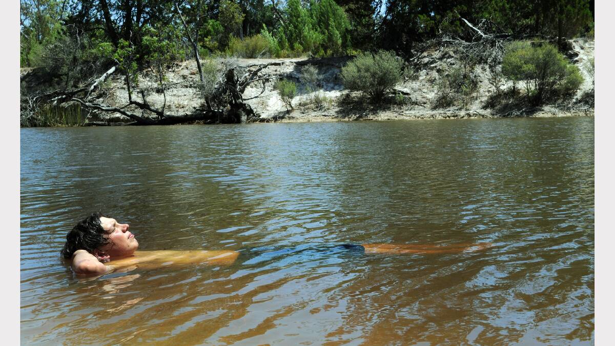SERENITY: Morwell’s Jason Ferguson enjoys a dip in the Wimmera River at Horseshoe Bend at Dimboola.  Picture: PAUL CARRACHER