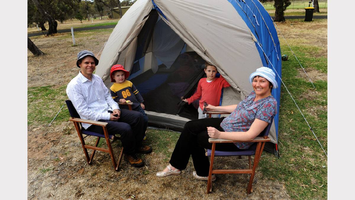 OVERNIGHT: Chris and Emma McMurray with their sons Thomas, 4, and Eric, 8, from Adelaide. The family  stopped at Horsham Caravan Park for one night on their way to Ballarat.