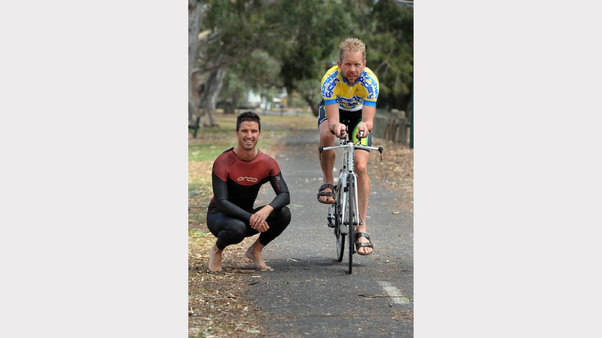 ON YOUR MARKS: Wimmera athletes Mark  Pumpa and Cameron  Evans inspect the track  ahead of tomorrow’s Horsham Triathlon. Picture: PAUL CARRACHER