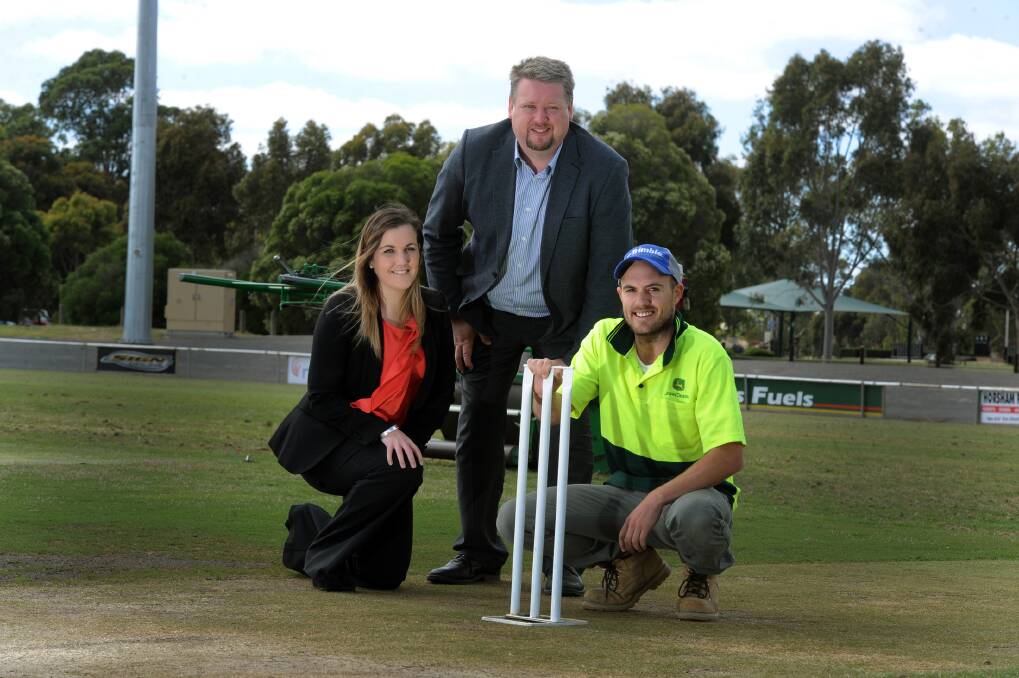 ANTICIPATION: Horsham Cricket Association’s Carr-McRae Twenty20 grand final will be played on Sunday at Horsham City Oval. Ready for the contest are Carr-McRae’s Maddie Chamberlain and Stuart Livingstone along with cricketer Matt McKinnon, right. Picture: PAUL CARRACHER