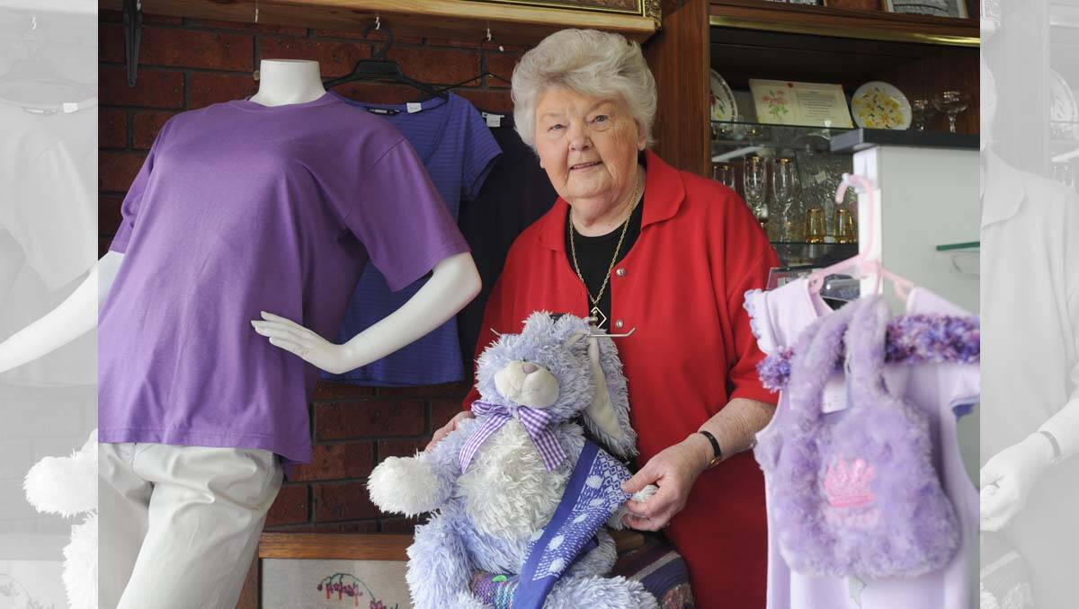 Pat Bennett in the Wimmera Base Hospital Ladies Auxiliary opportunity shop window.