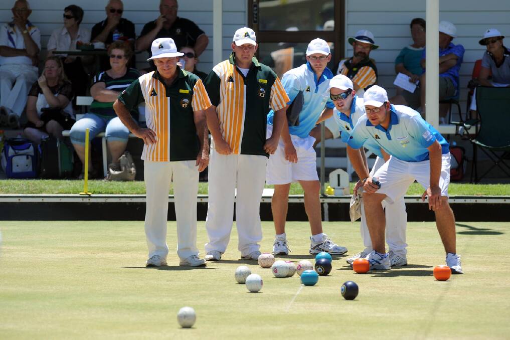 JANUARY 2013: Players watch a bowl playing in Victoria Men's Region Sides Championship. 