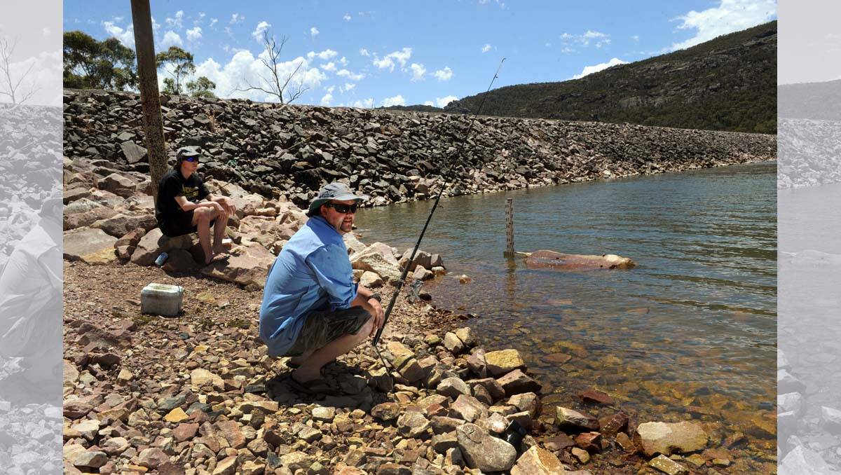Brendan Anderson and Matthew Anderson, left, Ballarat, try a spot of fishing at Lake Bellfield. 