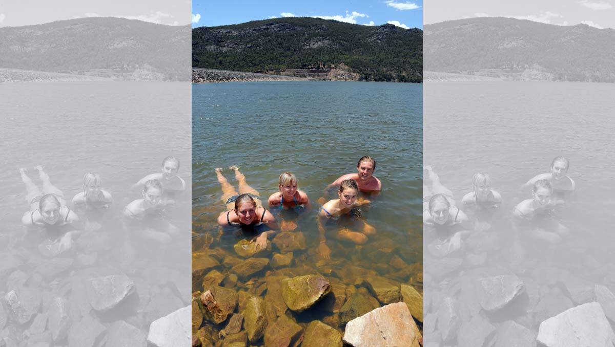 Sacha Pyke, Shirley van Waveren, Sophie Kemp and Cam Pyke enjoying a dip in Lake Bellfield.