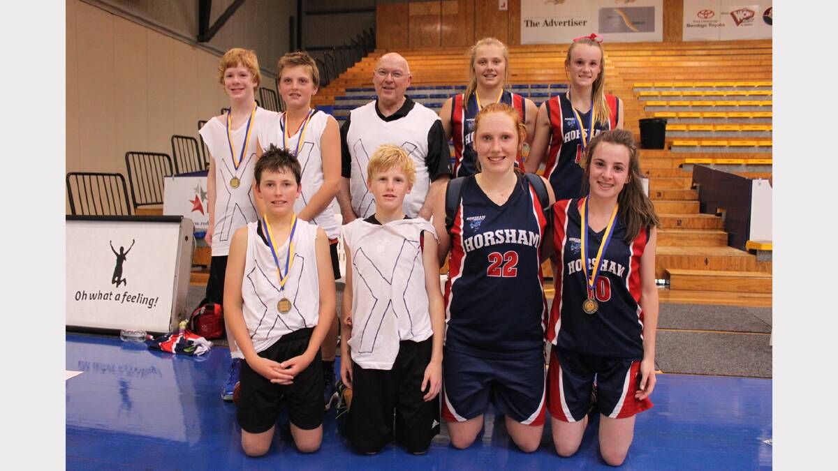 UNDEFEATED: Horsham's two three-on-three basketball teams won their divisions at the 3x3 Bendigo Braves Tournament on Thursday. From back, Teate Fennell, Josh Bibby, coach Owen Hughan, Ella Bibby and Faith McKenzie; front, Mitch Martin, Jeremiah McKenzie, Chloe Bibby and Alexandra Hiscock. Picture: CONTRIBUTED