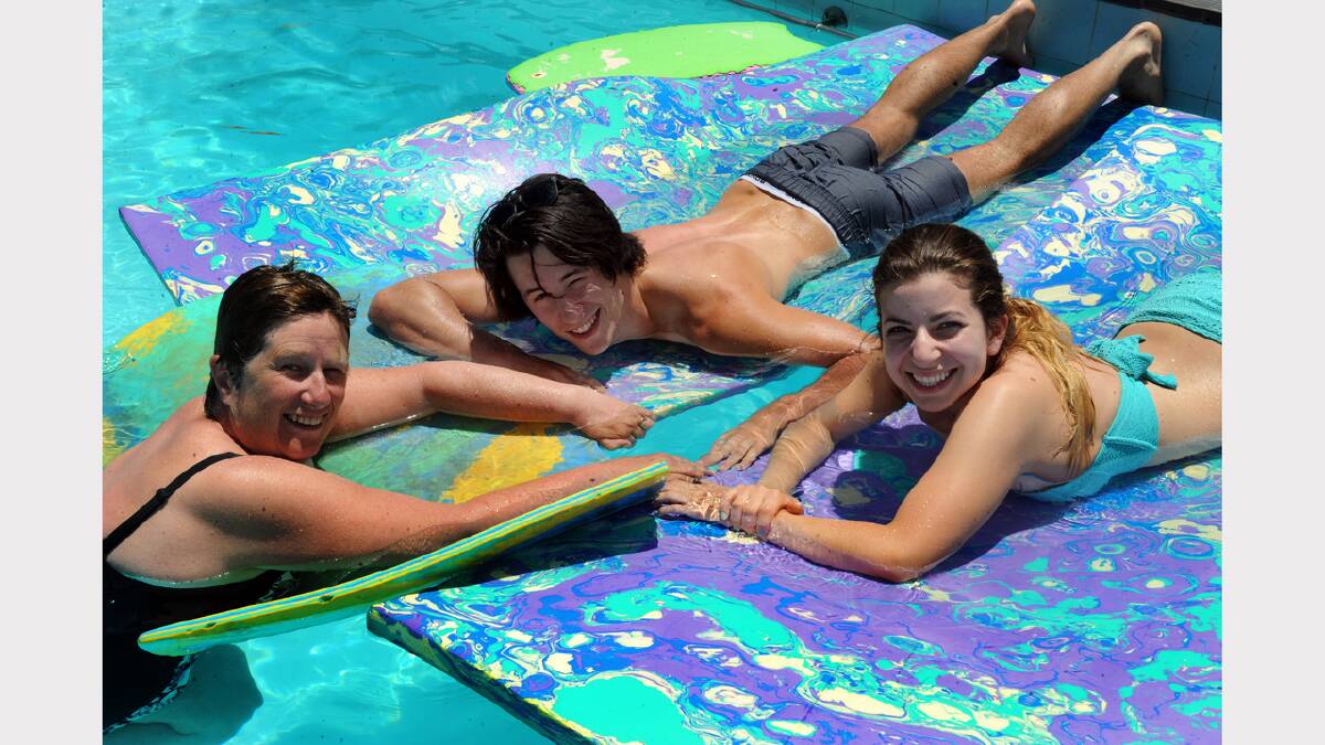 VISITING: Frances Hoare, Mark Hoare and Amy Cafarella from Geelong enjoying the Halls Gap pool. Picture: PAUL CARRACHER