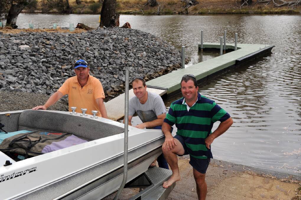 ALL SMILES: Steve Shurdington, Dave Alexander and Dave Donnell check out the upgraded boat ramp near Dimboola. Picture: PAUL CARRACHER.