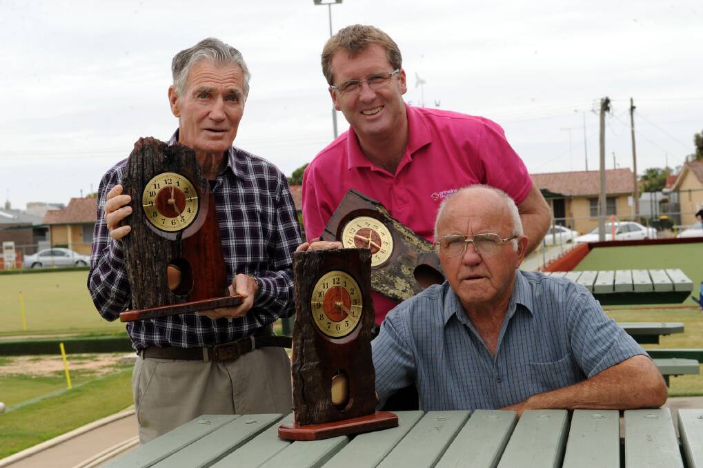 BOWLING LEGACY: Bill McGrath, Stuart Hall and Colin Morrell with trophies Colin made for Saturday's Legacy Bowls Tournament winners. Picture: PAUL CARRACHER.