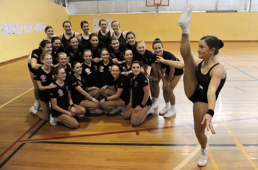 Horsham's St Brigid's College will send three teams to the National Schoolaerobics Championships in Sydney this weekend. Ella Francisco limbers up in front of her team-mates.