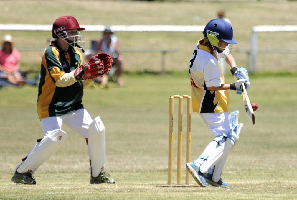 KEEPING UP: Wimmera-Mallee captain and wicket-keeper Sam Griffi ths, left, keeps a close eye on the ball at under-13 Country Week in Portland. Picture: KIRSTY HILL, PORTLAND OBSERVER