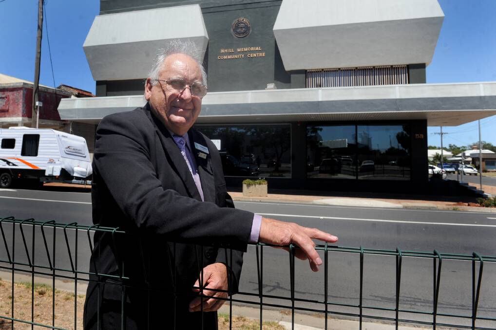 REEL TIME: Hindmarsh Mayor Rob Gersch believes Nhill Cinema's digital future will be bright, despite the cinema being unable to screen new release films because its equipment is outdated. Inset, Nhill's cinema, as it was in the early years. Picture: SAMANTHA CAMARRI