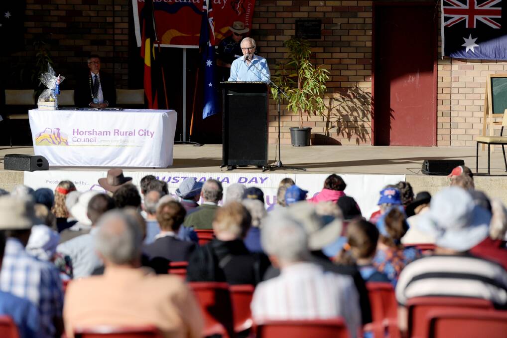 LOOKING AHEAD: Australia Day ambassador and racing identity Tony Cavanagh addresses people at Horsham’s Australia Day ceremony in Sawyer Park. Picture: SAMANTHA CAMARRI