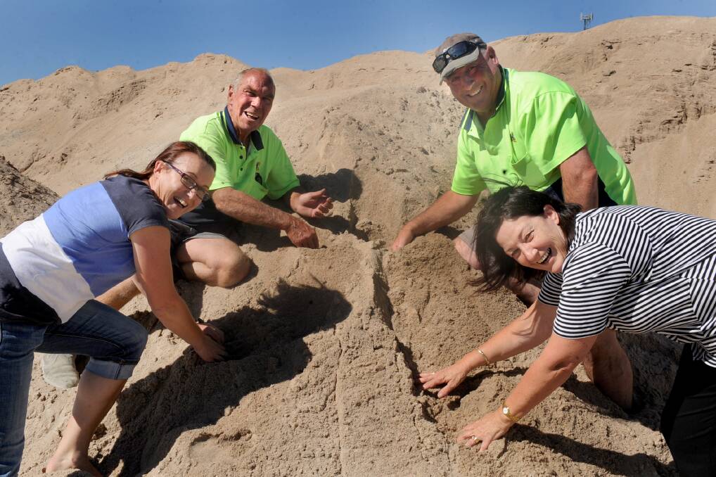 DIG DEEP: Wimmera residents will have a chance to dig for diamonds and other prizes along the Wimmera River as a fundraiser for the 100 Chicks Chase 100 Clicks initiative. Pictured preparing for the dig are, from left, committee member Tracey Taylor, Horsham Concrete Company's Bruce Schilling and Jack Schmidt and committee member Di Ellifson. Picture: SAMANTHA CAMARRI