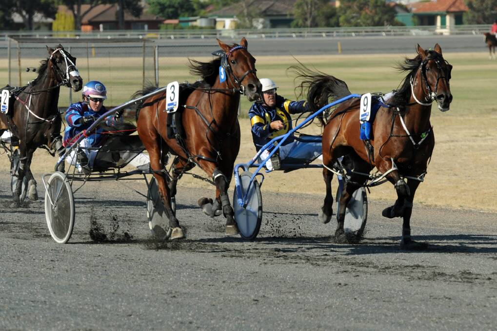 WIN: Melpark Major, number three with Amy Tubbs in the seat, wins the 2013 Horsham Pacing Cup from Smoken Up. Picture: PAUL CARRACHER