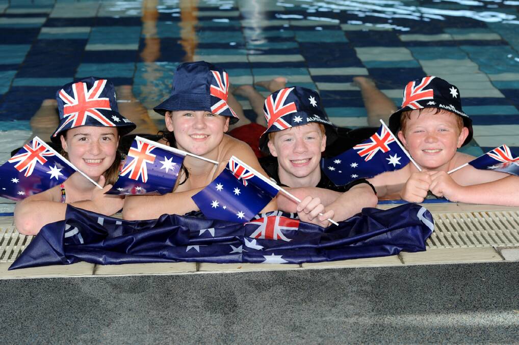 POOL PARTY: Mackenzie Fennell, 13, Hayley Ellis, 13, Tate Fennell, 11, and Mackay Baker, 12, of Horsham, get ready for the Australia Day pool party at the Horsham Aquatic Centre. Picture: SAMANTHA CAMARRI