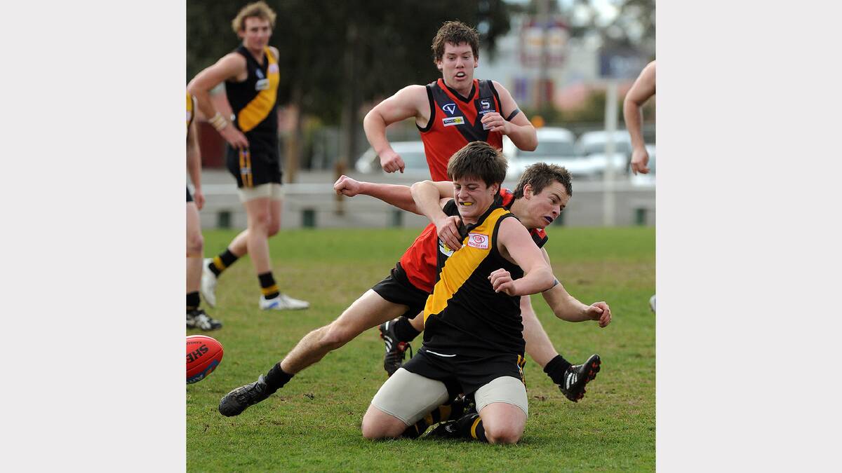 2010: Horsham United's Conor Lawson gets tackled by Stawell's Jesse Eckel.