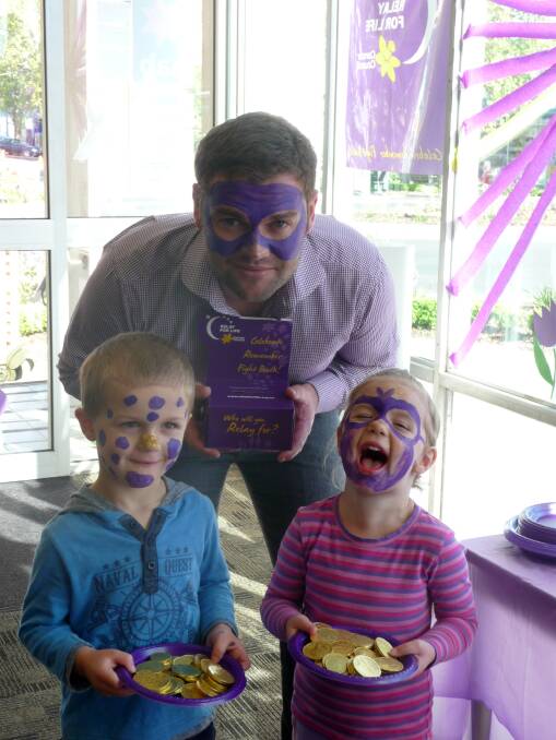 NAB financial planner Rob Mahony with Piper and Josh Taylor at a NAB purple morning tea.