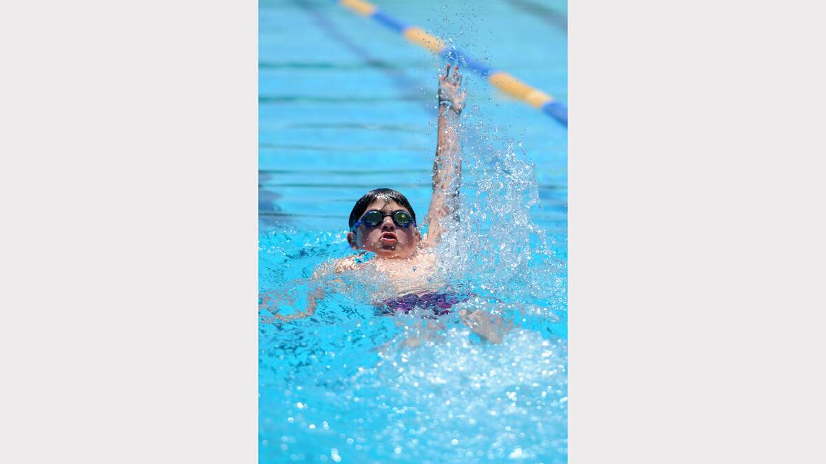SPLASH: Stawell junior swimmer Angus Stoffel competes in a backstroke event during the Horsham Swimming Club meet.