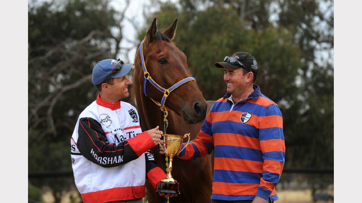 ROAD TO GLORY: Trainer Grant Campbell and owner Justin Lane with their charge National Service, who is an outside chance in Sunday’s Horsham Pacing Cup. Picture: PAUL CARRACHER