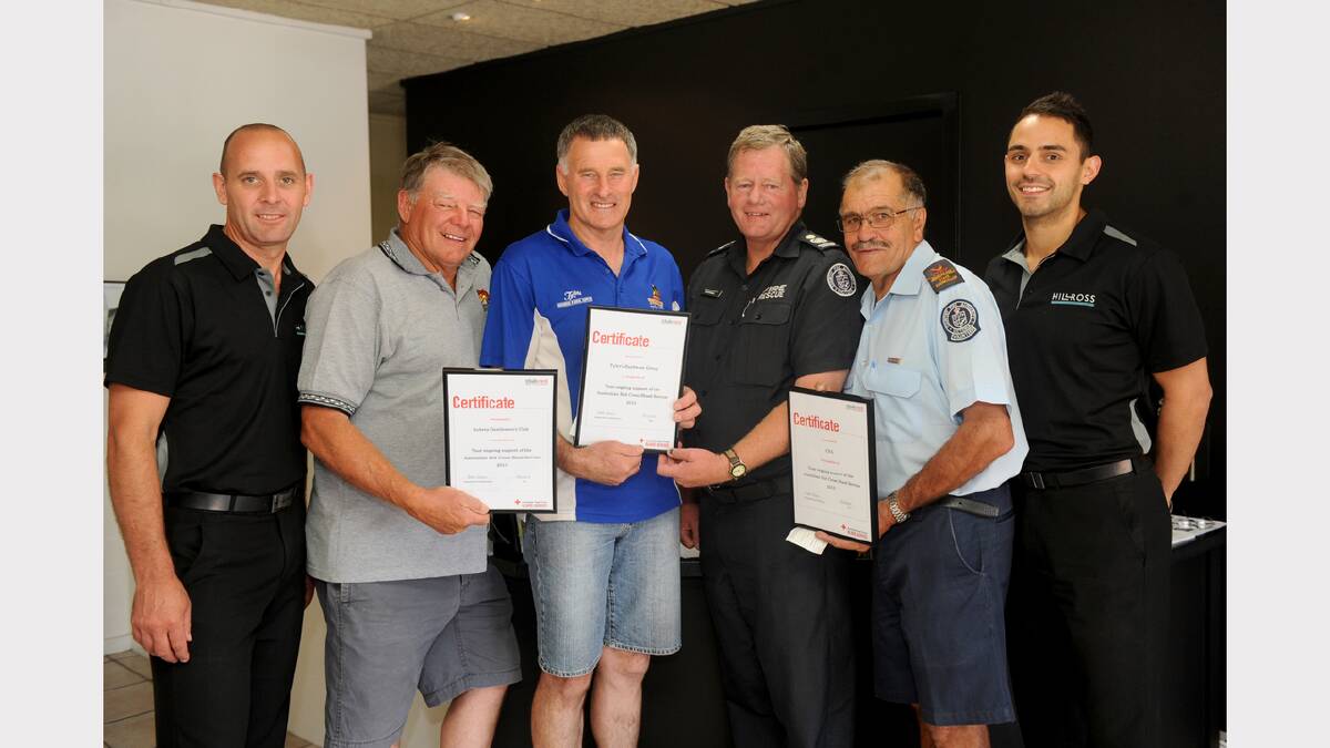 BLOOD WORTH BOTTLING: Hillross representative Dean Winfield, left, with blood challenge leaders Marshall Rodda of Aubrey Gentlemen’s Club, Adrian Tyler of Tylers Hardware Group, Dale Russell of District 17 Country Fire Authority, John Davies of Volunteer Fire Brigades Victoria and Hillross representative John Manserra. Picture: SAMANTHA CAMARRI