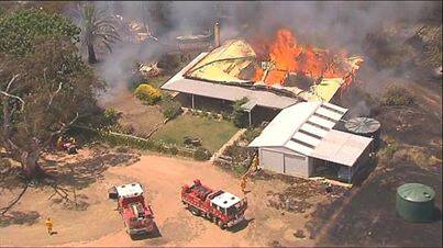 GONE: Rosebrook homestead in flames last week. 
