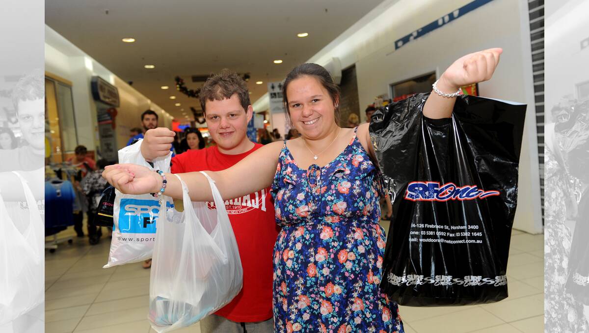 BARGAIN HUNTING: Horsham siblings Alex and Maddy Pickering take advantage of Boxing Day sales. Picture: SAMANTHA CAMARRI