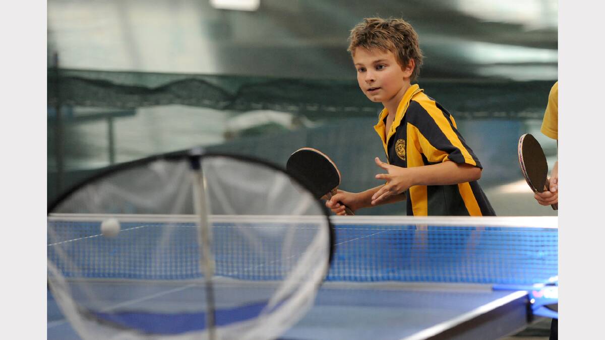 EFFORT: Horsham West Primary School year five student Brock Foscarini concentrates while playing table tennis.