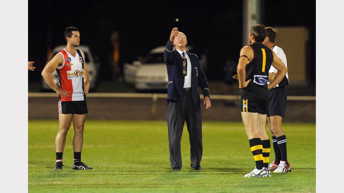 2012: Clarrie Dickerson tosses the coin for the Horsham RSL Diggers v Horsham Saints Anzac Day clash.