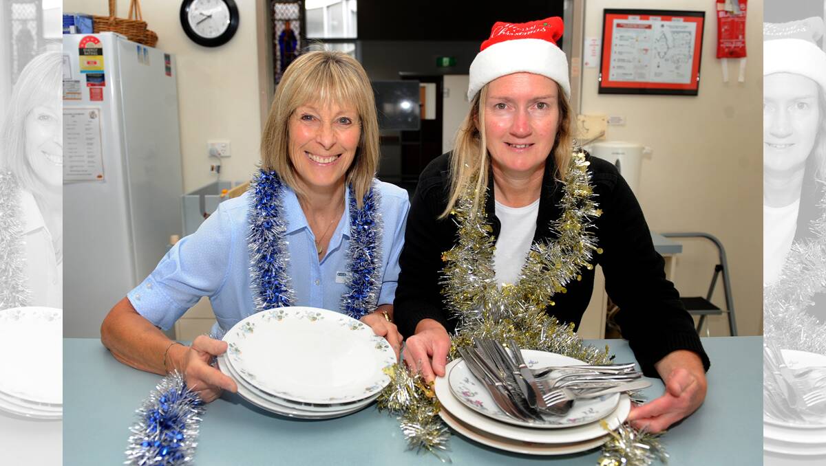 TUCK IN: Co-ordinators Mandy Kirsopp and Jenny Payne prepare for the Christmas Day lunch.