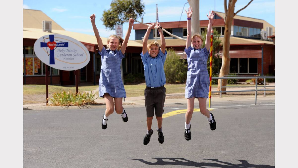 READY FOR SCHOOL: Holy Trinity Lutheran School year six students Tarlie McCartney, Ahren Koch and Abbey Hawker, all 12, are excited to be part of the school’s first year seven class next year. The school will expand to include years seven to nine. Picture: SAMANTHA CAMARRI