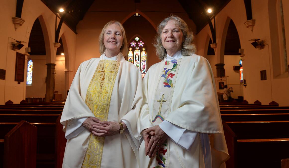HISTORY-MAKING: Stawell Reverend Anne McKenna, left, and Warrnambool Reverend Robyn Shackell became the Anglican Diocese of Ballarat’s first women priests during a ceremony in the Ballarat Anglican Cathedral on Saturday. Picture: THE COURIER