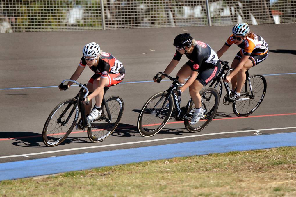CHASE: Marquessa Jelbart and Imogen Jelbart of Bendigo and District Cycling Club and Teagan-Jane Westendorf of Brunswick Cycling Club compete in the open women’s Victorian Elimination Championship as part of the Horsham Cycling Carnival.