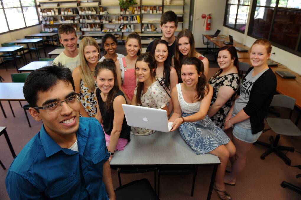 Horsham College dux Taha Mollah, left, with fellow VCE students celebrating their results. Picture: PAUL CARRACHER