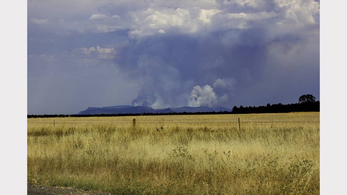 THURSDAY: Megan Elliott captured these photos of the Grampians fire from Green Lake and Longerenong Road.