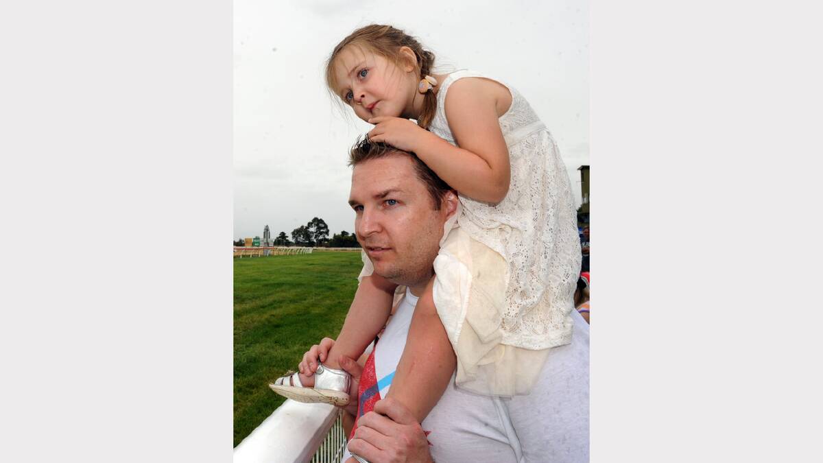 FAMILY TIME: David Beckett and daughter Ella, 3, watch the cup at Murtoa.
