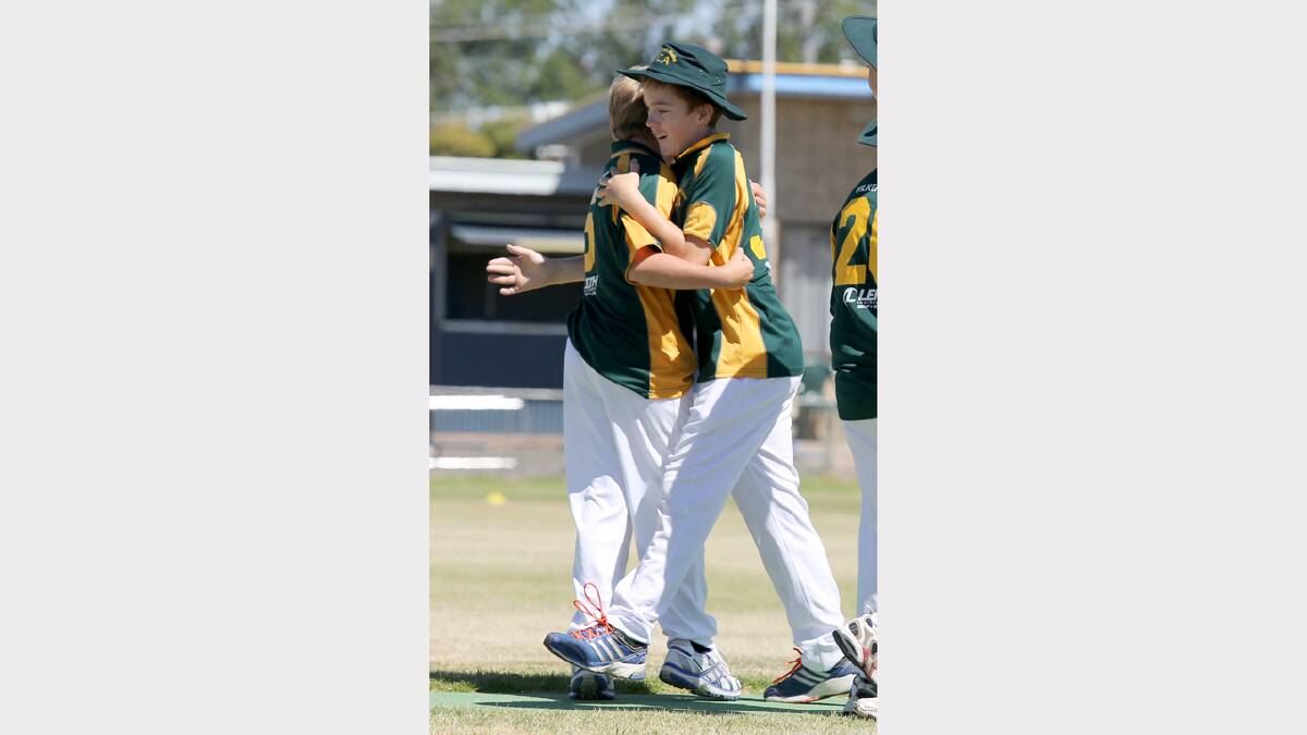 SPIRIT: Donald teammates Patrick Morgan, 11, and Sam Downes, 12, hug during the Under-14 Country Week competition at Nhill. Picture: THEA PETRASS