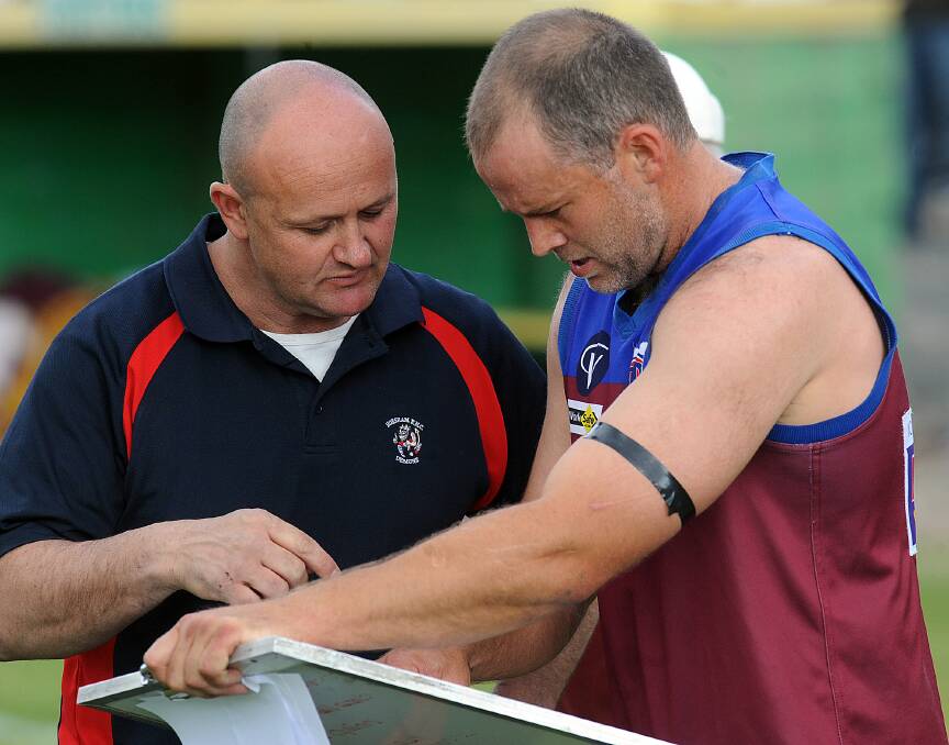 Seven-time premiership coach Stuart Farr was sacked by Horsham Demons this week. Farr, right, is pictured with Louis Dalzeil.