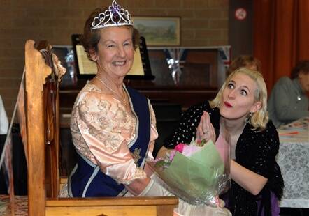 Marian Hobbs plays the Queen at Queen's Diamond Jubilee high tea at Warracknabeal's Anglican Hall. Singer Monique Le Bas performed.