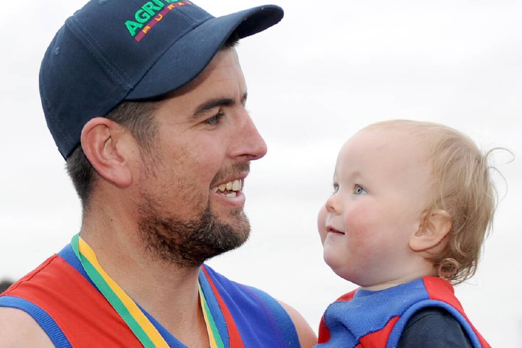 Tim Wade with son, Baxter. Kalkee's fifth senior premiership in the Horsham District Football League