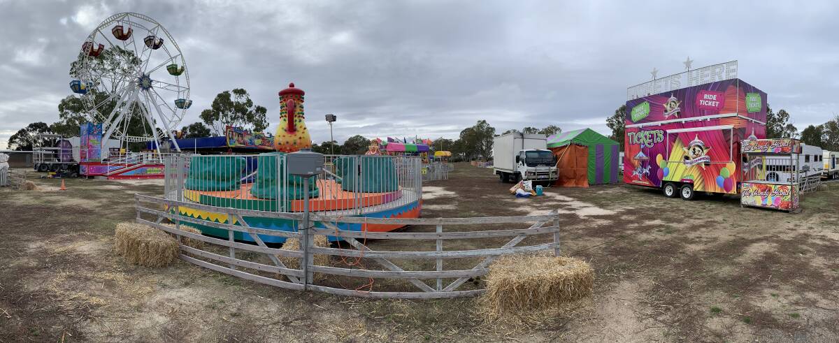 CARNIVAL: Plenty of rides and games being set up for the fair. Picture: ALISON FOLETTA