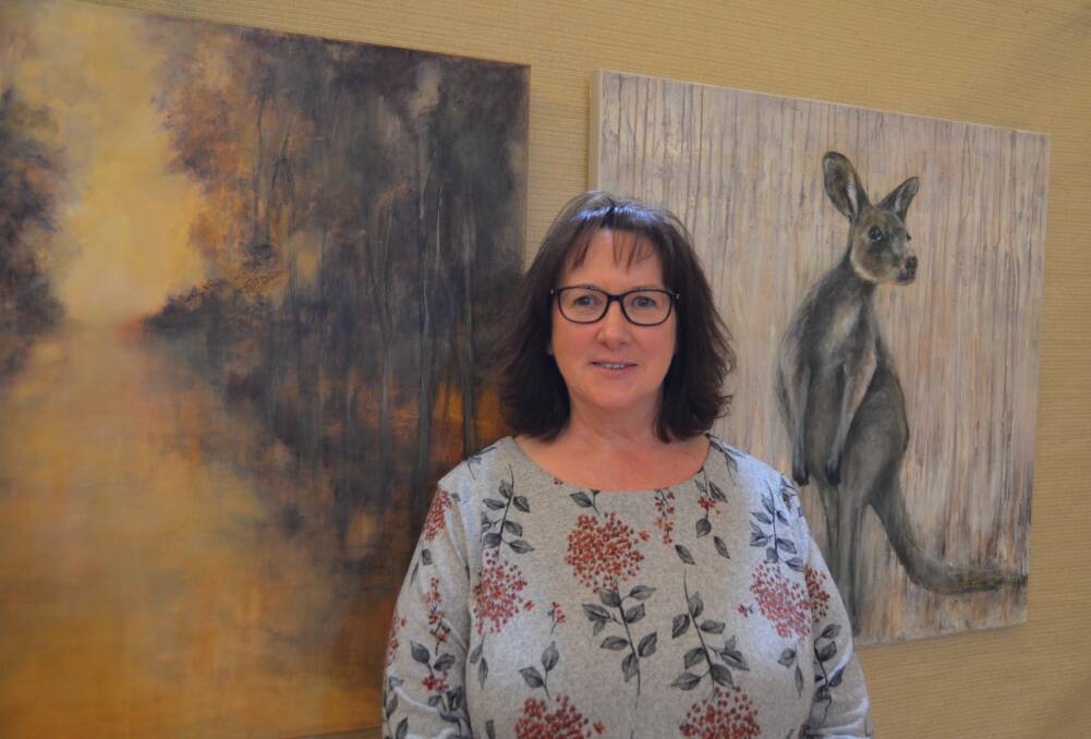 ADDICTED: Leanne Onley who has be awarded accolades for her work said she is addicted to painting. Picture: ALISON FOLETTA.