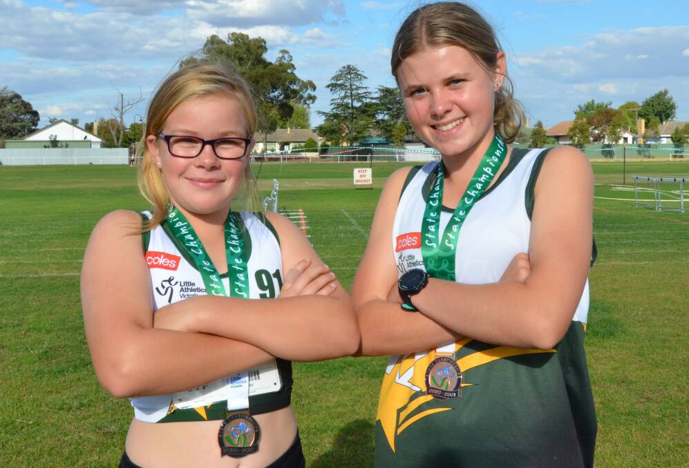 GIRLS IN SPORT: Piper Knorpp 9, and Mayci Porter 16, with their state champion bronze medals. Picture: ALISON FOLETTA. 