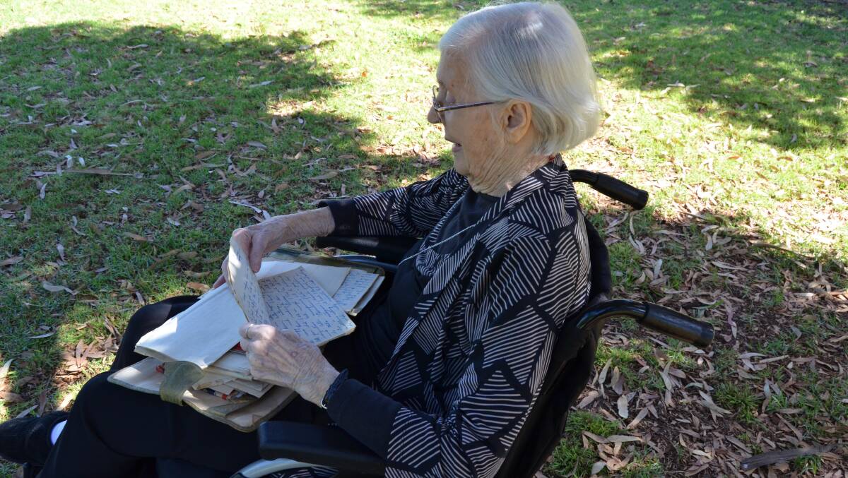 LOVE LETTERS: After over 70 years, Ms Paech holds onto the many letters she and John sent to each other. Picture: ALISON FOLETTA.