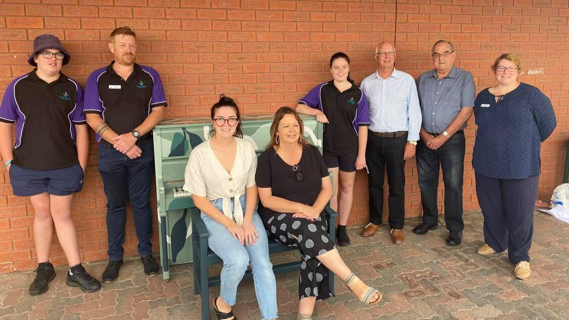 PIANO TOWN: Youth Councillor Sailor Knorpp, Youth Officer Justin Knorpp, artist Abby Sleep, donor Meg Streeter, Youth Councillor Sophie Evans, Mayor Graeme Massey, pianist Graeme Addinsall and Councillor Karly Kirk at the unveiling of the community piano in Warracknabeal. Picture: CONTRIBUTED.