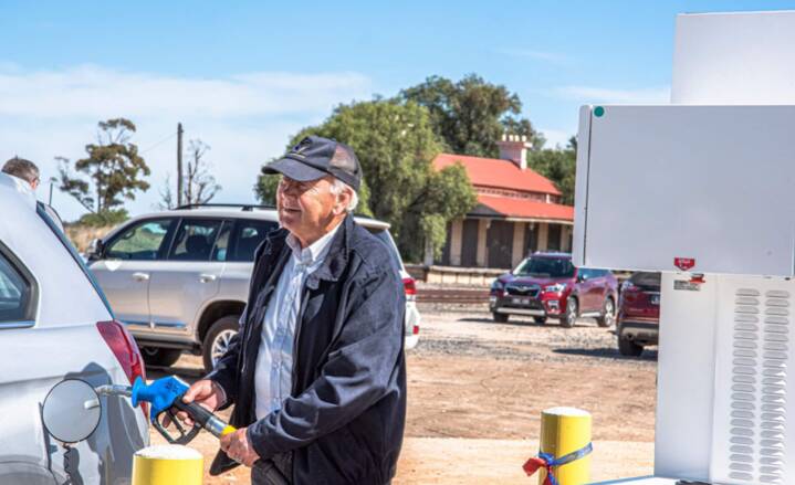 IT'S A GAS: Project manager, Ray White, filling up his car with petrol after battling for three years to have a petrol station in Minyip. Picture: SUPPLIED.