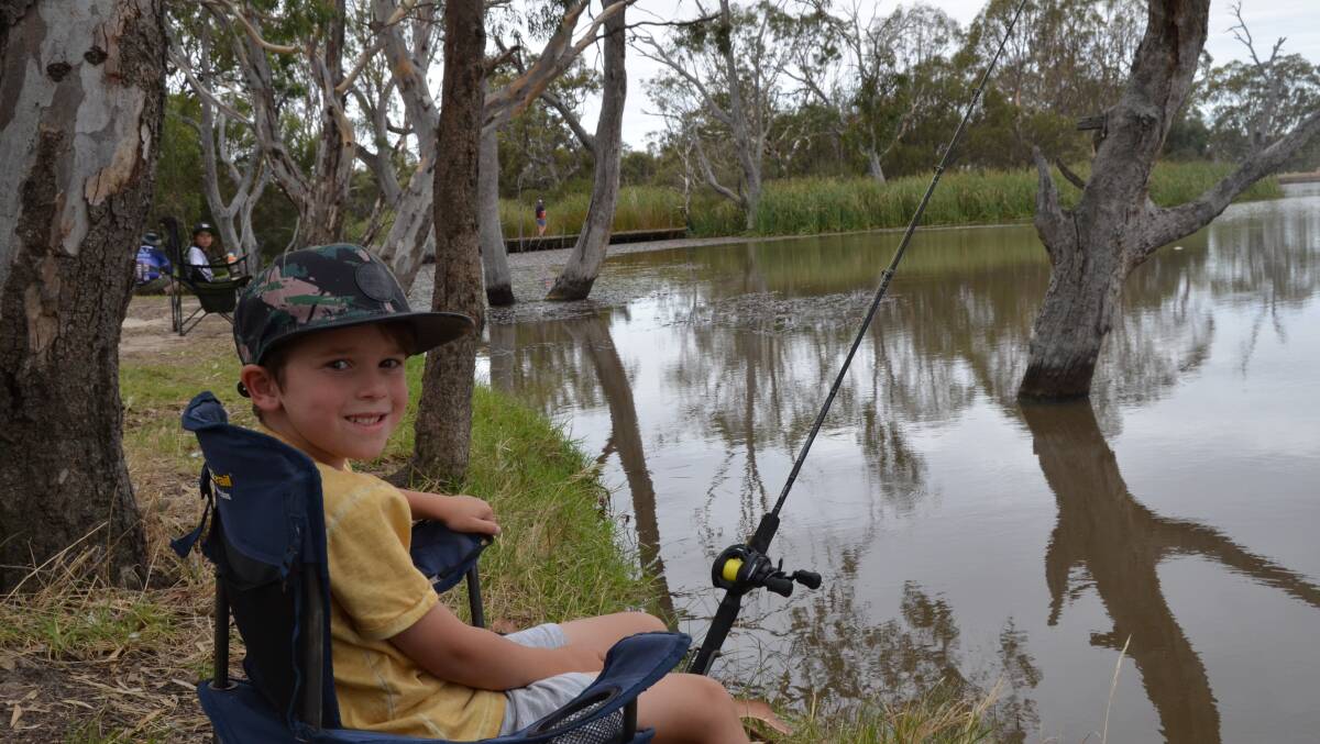 ON THE RIVER: Ollie Mackley, 6, managed to catch a decent sized yellow belly despite many other fishers coming up dry. Picture: ALISON FOLETTA.