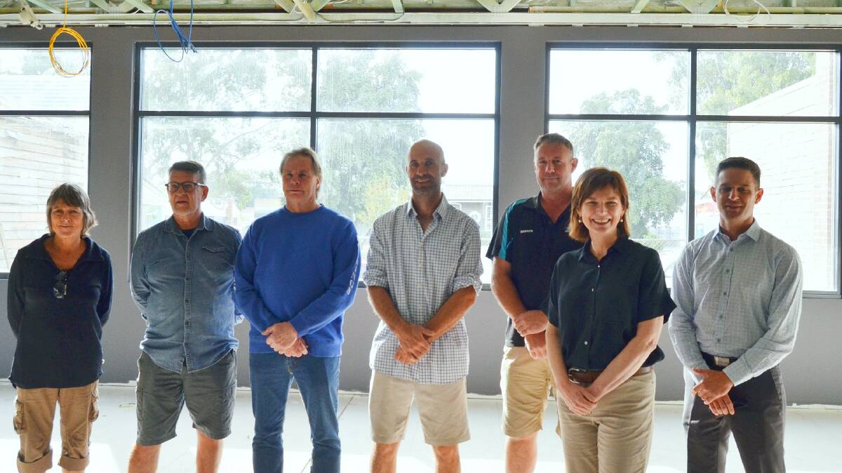 TOWN PRIDE: Yarriambiack councillor Corrine Heintz, Enterprise Rupanyup chairperson Malcolm Uhe, builder John Onley, councillor Tom Hamilton, builder Warren Frost, minster Mary-Anne Thomas and manager for community health Tim Rose inside the hub. Picture: ALISON FOLETTA.