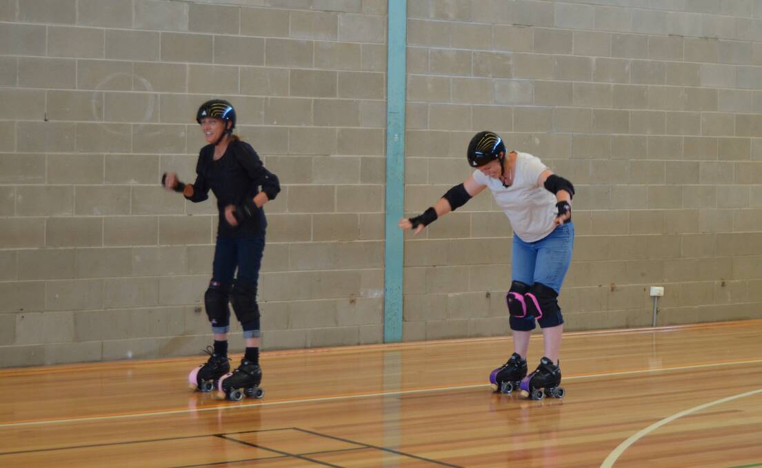 TOGETHER: Mates, neighbours and work buddies Wendy Blundell and Bec Saunders, from Dimboola, decided to give skating a go together. Picture: ALISON FOLETTA.