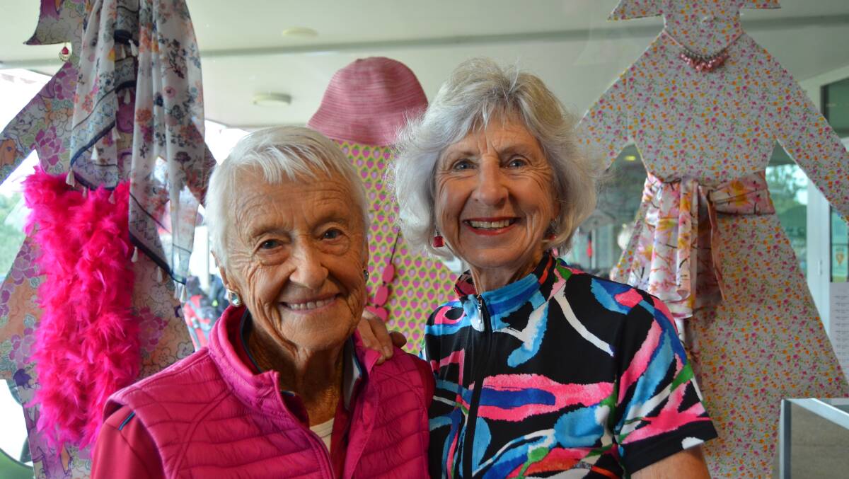 PINK LADIES: Cancer survivor Dorothy Adamson with golf partner Bernie Delahunty. Picture: ALISON FOLETTA.